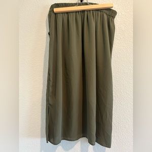 Woman’s green midi skirt